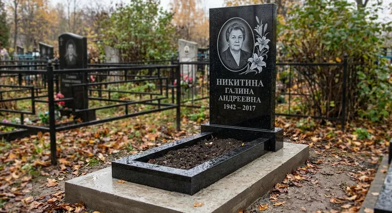 Памятник с гравировкой лилий — выполненная работа «Никитина» в Набережных Челнах