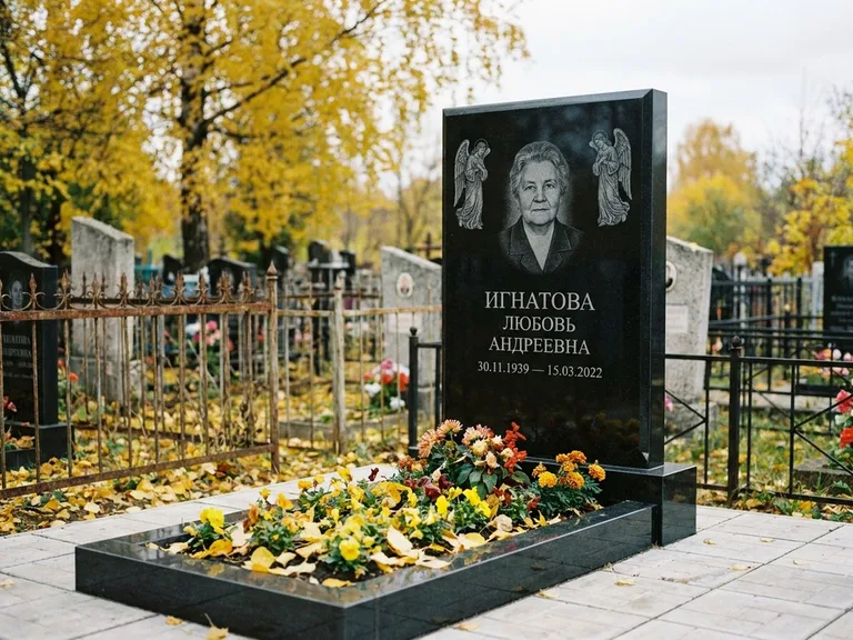 Памятник с гравировкой ангела — гравировка двух ангелов по сторонам портрета, работа «Игнатова» в Набережных Челнах